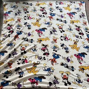 Brand new condition Disney Parks super soft fleece blanket w/Disney Characters!!
